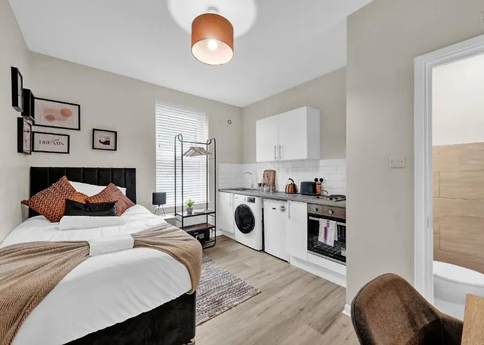 Minimalist Oasis: Airy Studio In Calming Neutrals